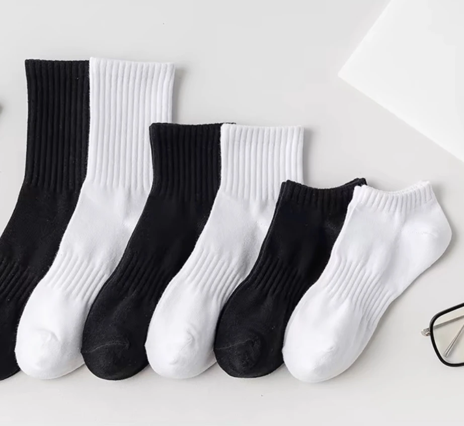 Unisex Compression Crew Length Cotton Socks Black and White Breathable Knit for Spring with Logo on Bottom Cuff for Running