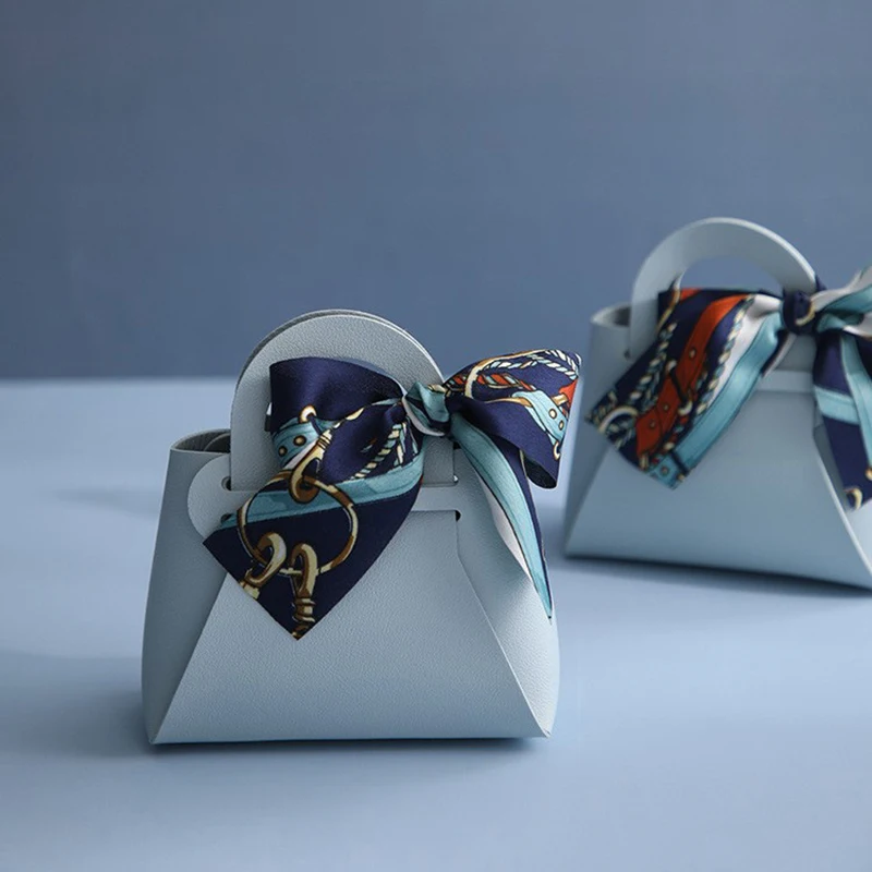 Розовая сумка из искусственной кожи с лентой