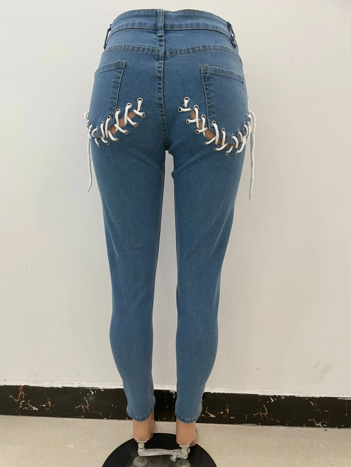 2021 fall fashion Stretch Elastic Ripped Hollow Out Denim Jeans Bandage Straight pants women skinny high waist ripped