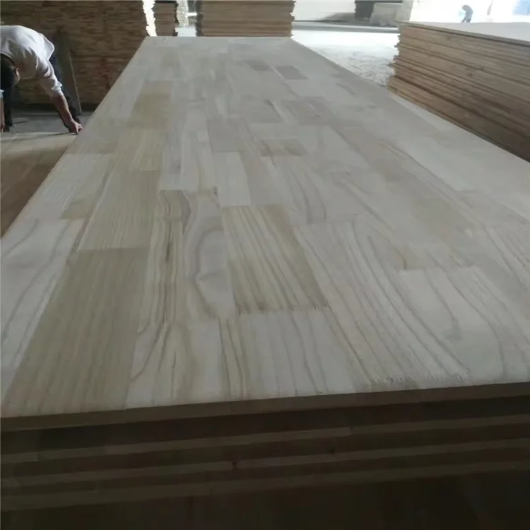 Customized 4*8ft paulownia veneer solid wood timber 12mm paulownia finger joint board
