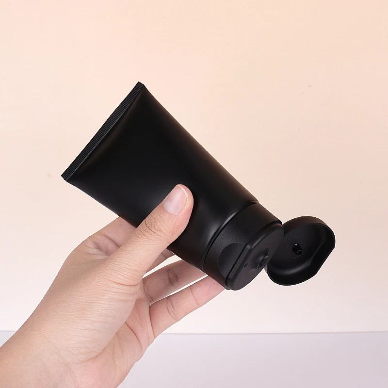 Custom logo matte black cosmetic plastic soft squeeze tube 100ml 150ml 200ml facial wash hand body cream bottle packaging