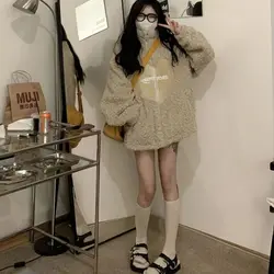 Luxury environmental protection imitation otter rabbit long fur fur coat women 2023 new mink fur coat factory direct sales.