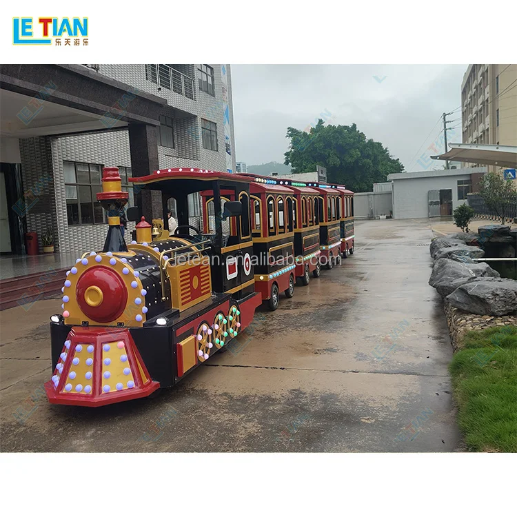 Outdoor public playground backyard kids locomotive train rides commercial shopping mall tourist trackless train