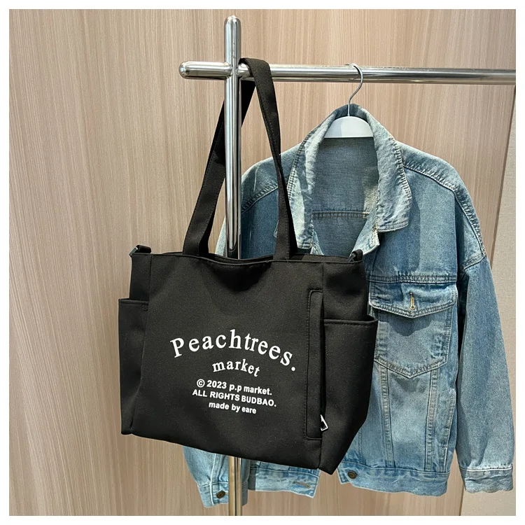 Student class canvas bag Female 2023 new fashion letter Tote commuter large capacity single shoulder crossbody bag