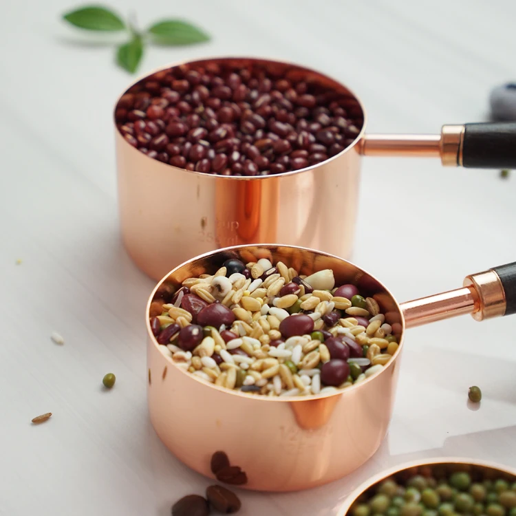 
Hot Selling 4pcs copper Stainless Steel Rose gold Measuring Cups set With Wooden Handle 