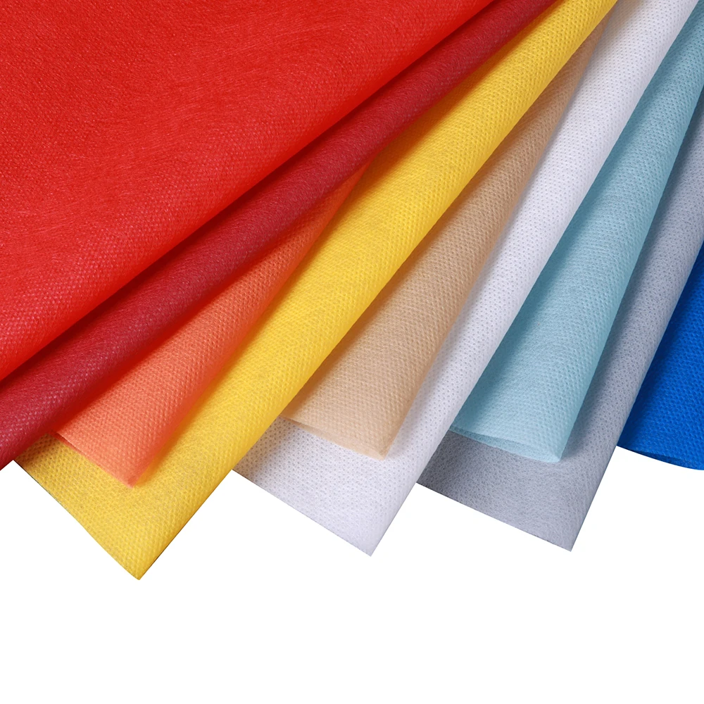 Good price eco-friendly PP nonwoven fabric 50g multi color tablecloth roll manteles TNT