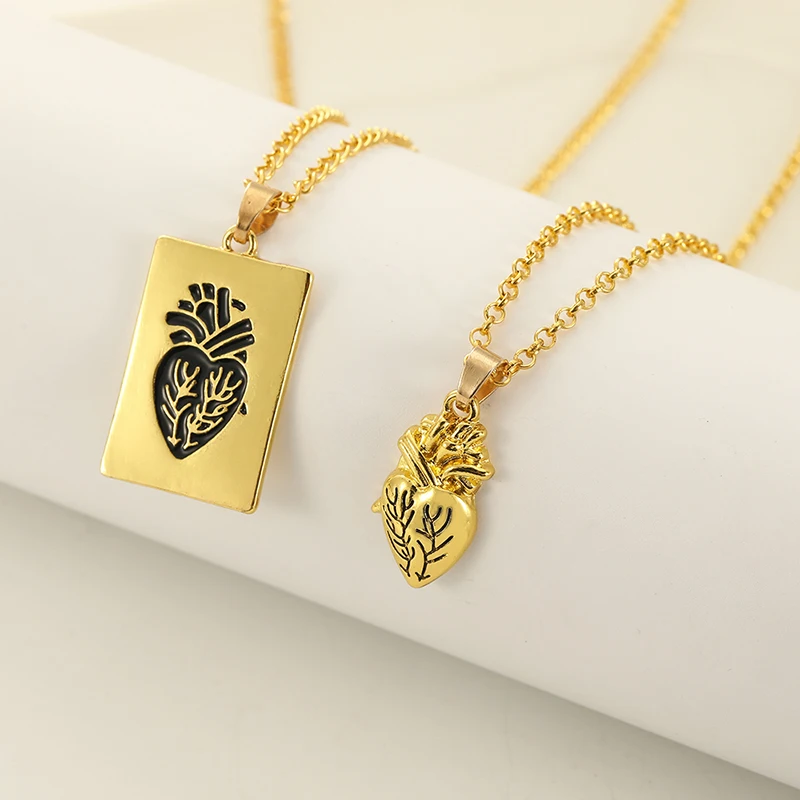 New fashion personality jewelry gold heart a pair of necklace couple alloy necklace manufacturers hot sales