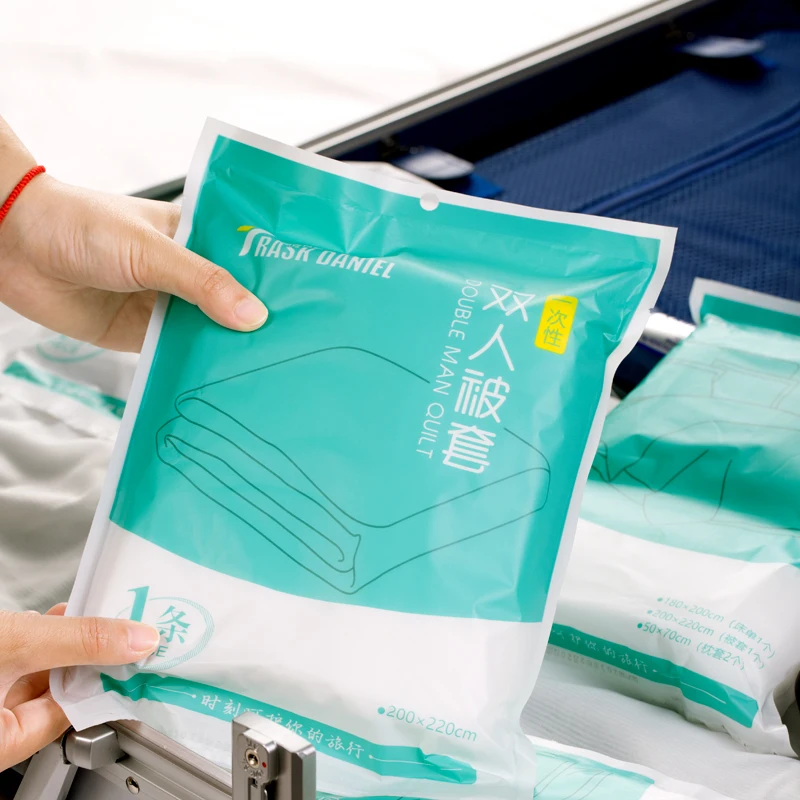 Hotel suppliers disposable towel bath towel Suit New Bag Cheap Non-woven fabric Oem Logo