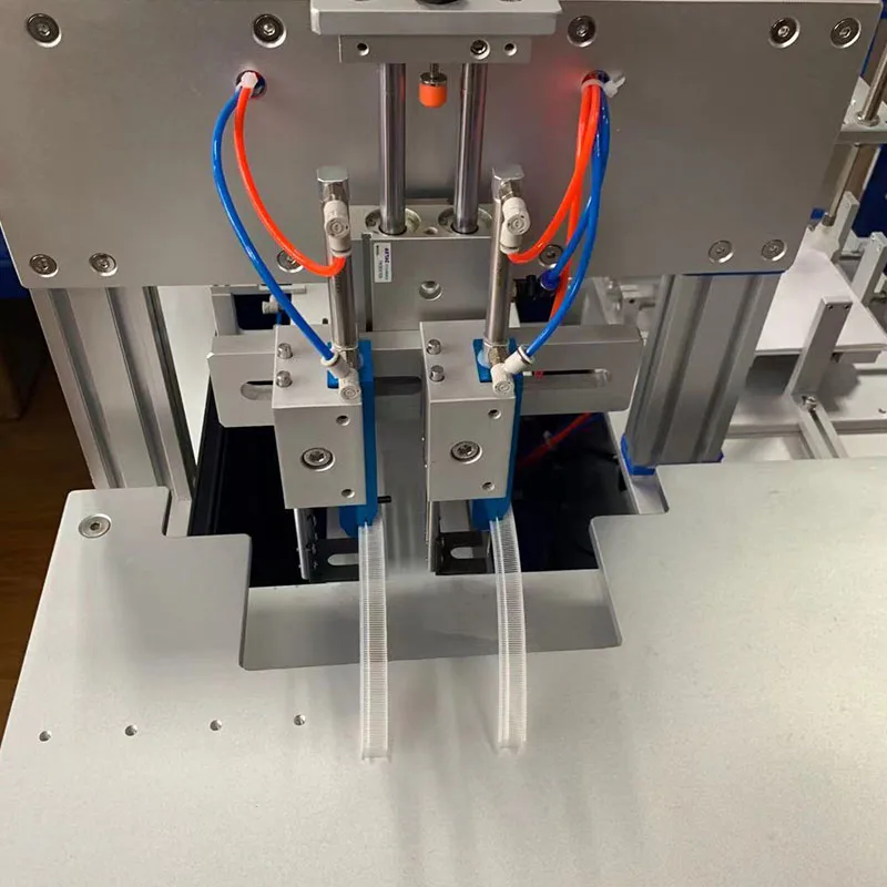 TM 4002  Automatic Feeding Tagging Machine For Towels Floor Mats Car Mats  Labeling Machines