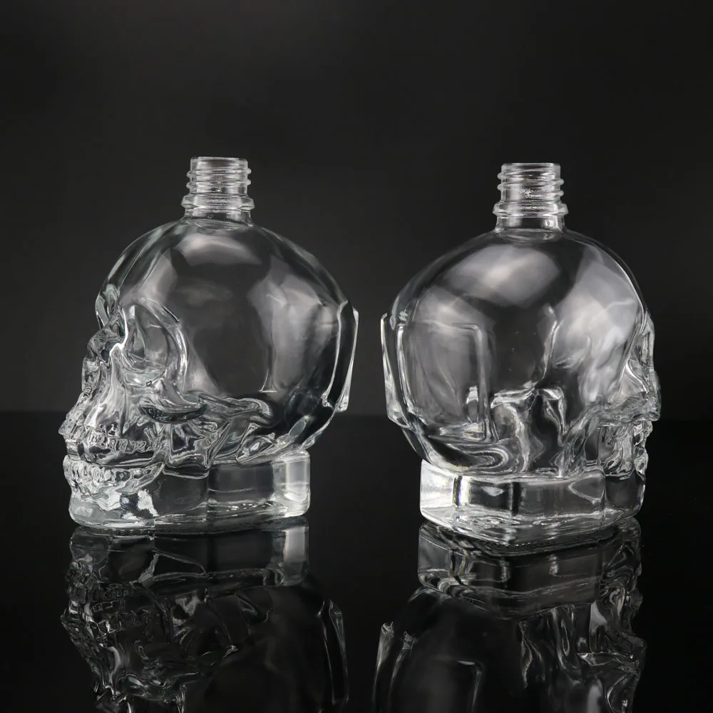Unique Design Empty 15ml 30ml 100ml Skull Glass Perfume Diffuser Bottle With Spray Cap