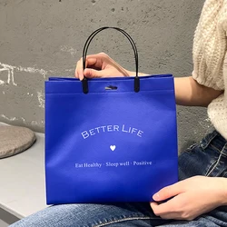 Wholesale environmentally-friendly degradable non-woven handbag free design LOGO gift shopping packaging clothes bag.