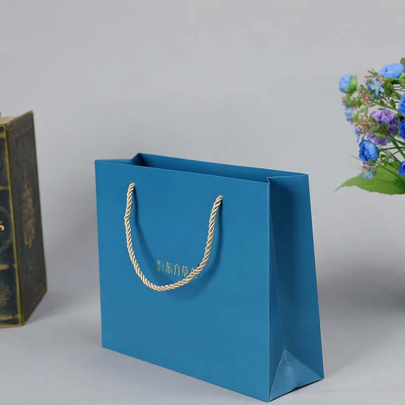 Customized logo design luxury gift carry  paper bag reusable flat bottom jewelry paper bag for eyeglasses shopping
