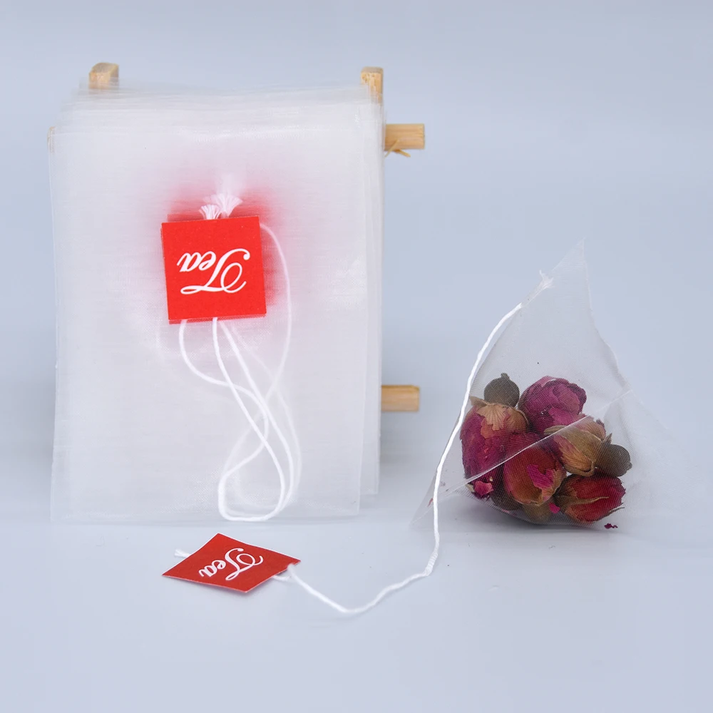 58 X 70mm Biodegradable Transparent PLA Corn Fiber Tea Bags  Heat Seal Pyramid Filters