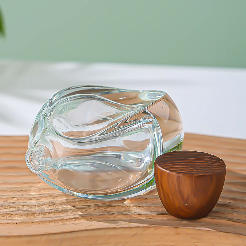 Luxury Custom Transparent Oval Perfume Bottle 50ML Thick Bottom Cologne Water Bottle Wooden Cover Perfume Spray