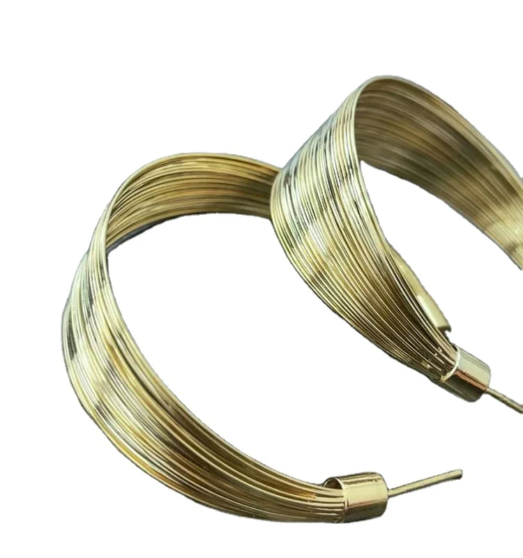 
Punk style golden earrings which attach to your ears. 