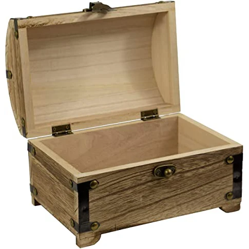 Decorated retro wooden treasure chest in natural wood-burning style with decorative metal profile and metal hinges
