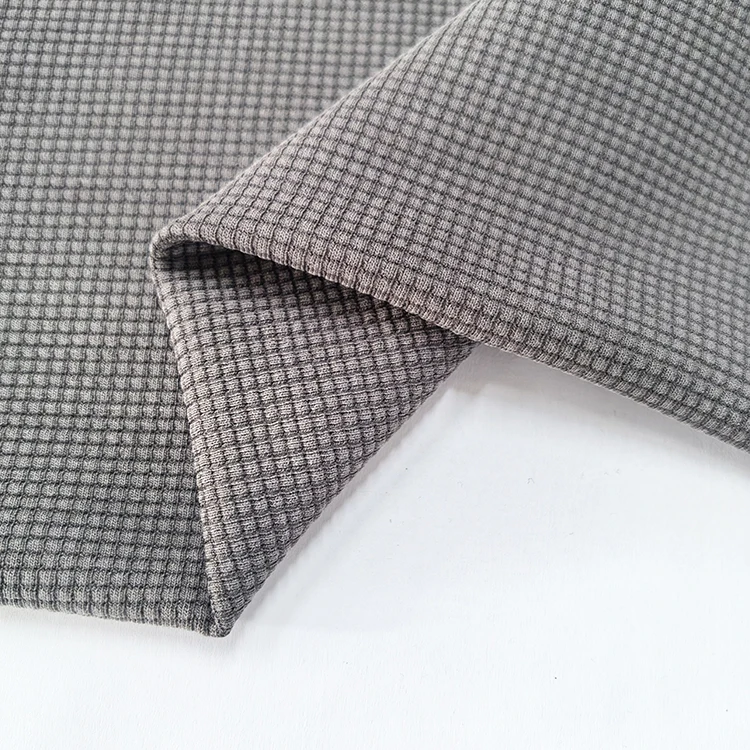 Custom Anti-bacterial Anti-Odor Polyester Cotton Tencel Elastane Knitted Waffle Interlock Fabric for Clothing Pants Tops