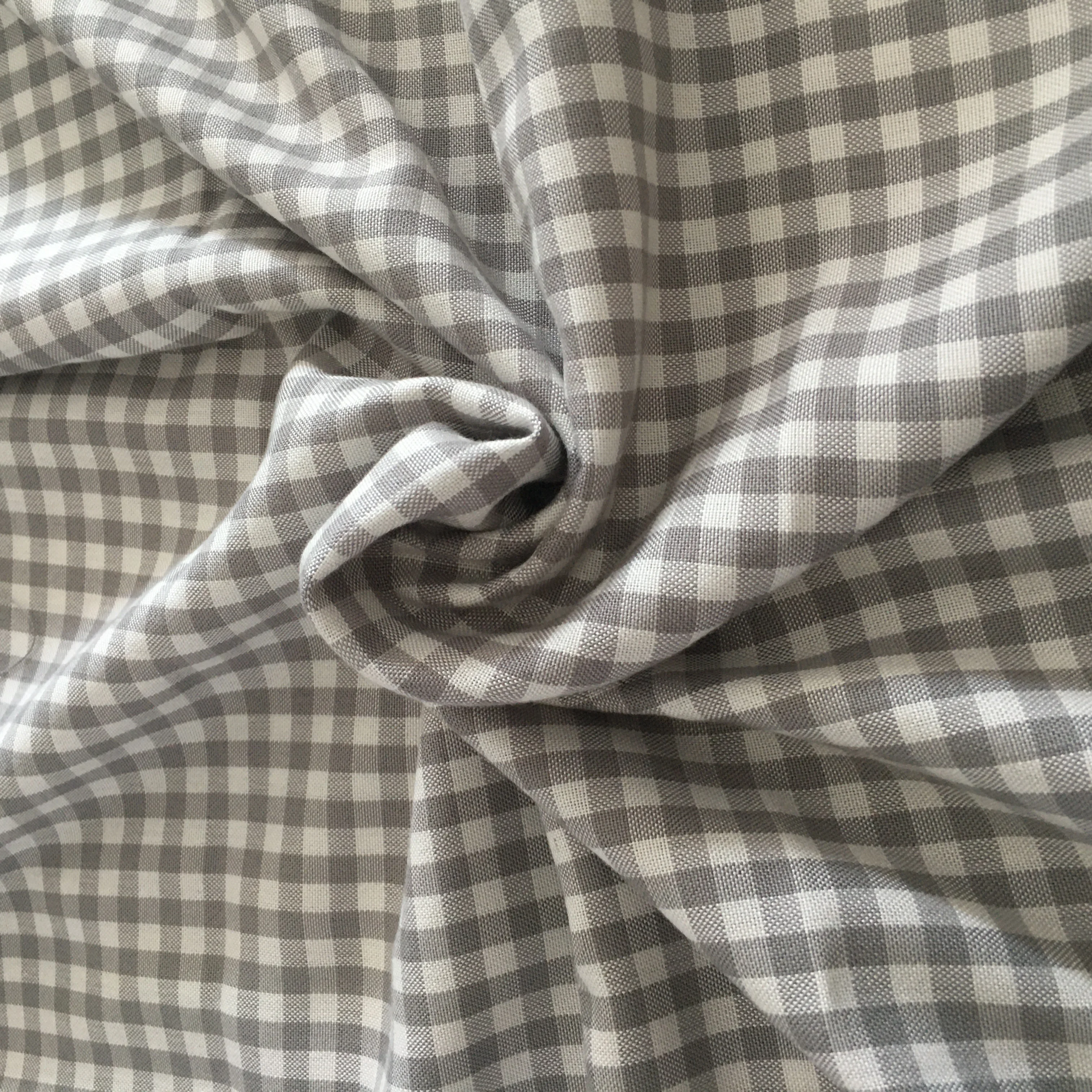 Soft and silky 100% cotton dyed and printed checked fabric