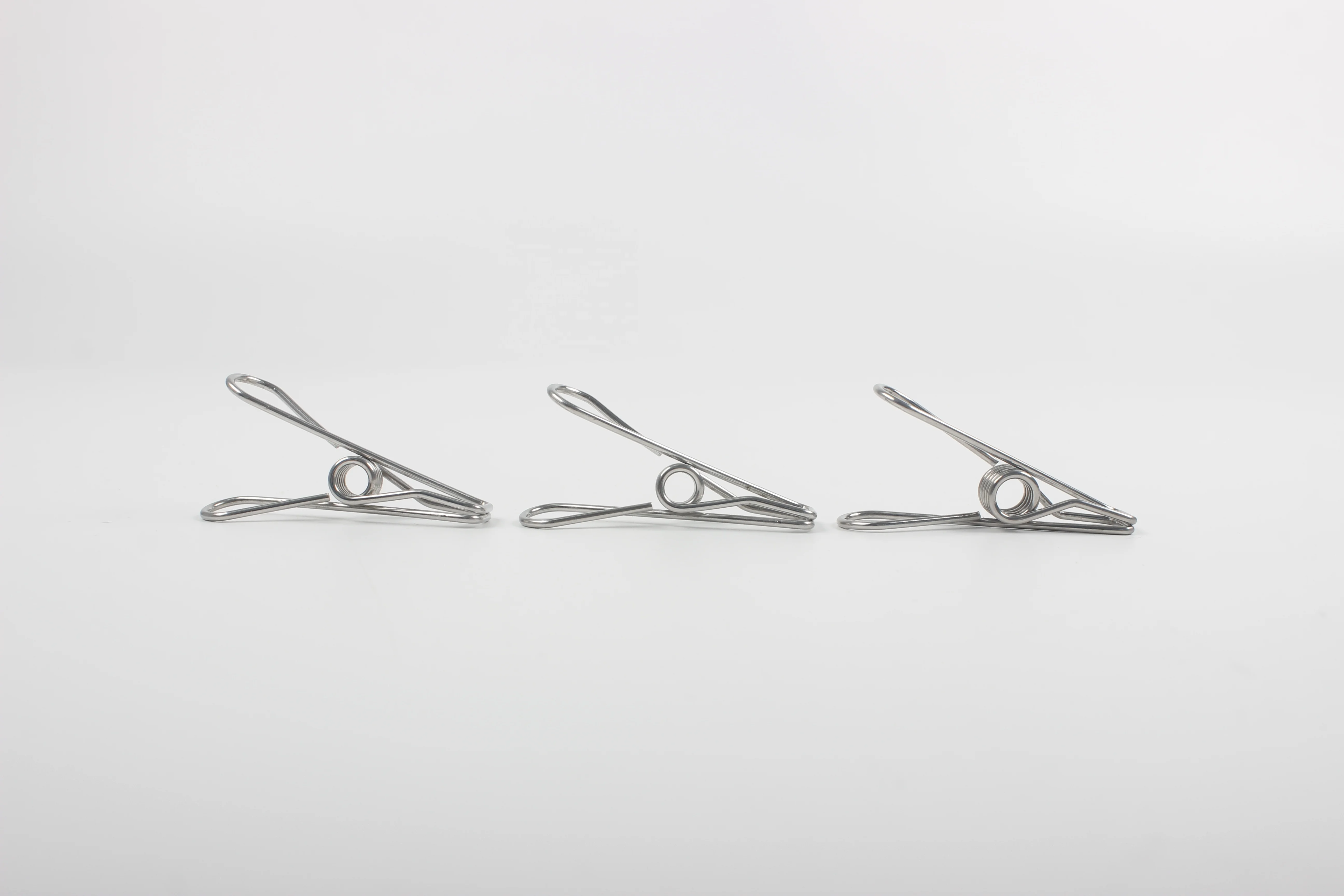 40 pcs clothes pegs 316 stainless steel in cloth bag with logo