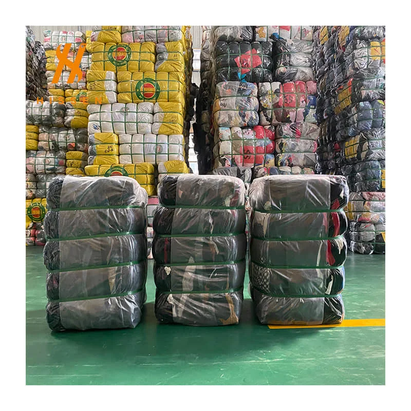 Wholesale prices are low cheap and used clothing bales are of high quality Second hand clothing packaging factories