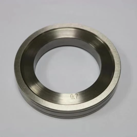 Spring machine wire feeder