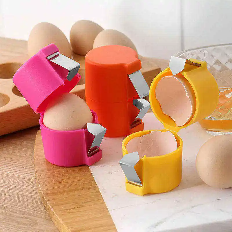 2025 New manual handheld plastic chicken kitchen tools egg cracker separator filter egg opener