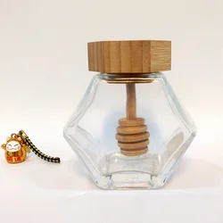 High-end Hexagon Honey Jar with Bamboo Stirring Rod Lids Honey Glass Jar Hexagonal Custom Label Sticker on Jars