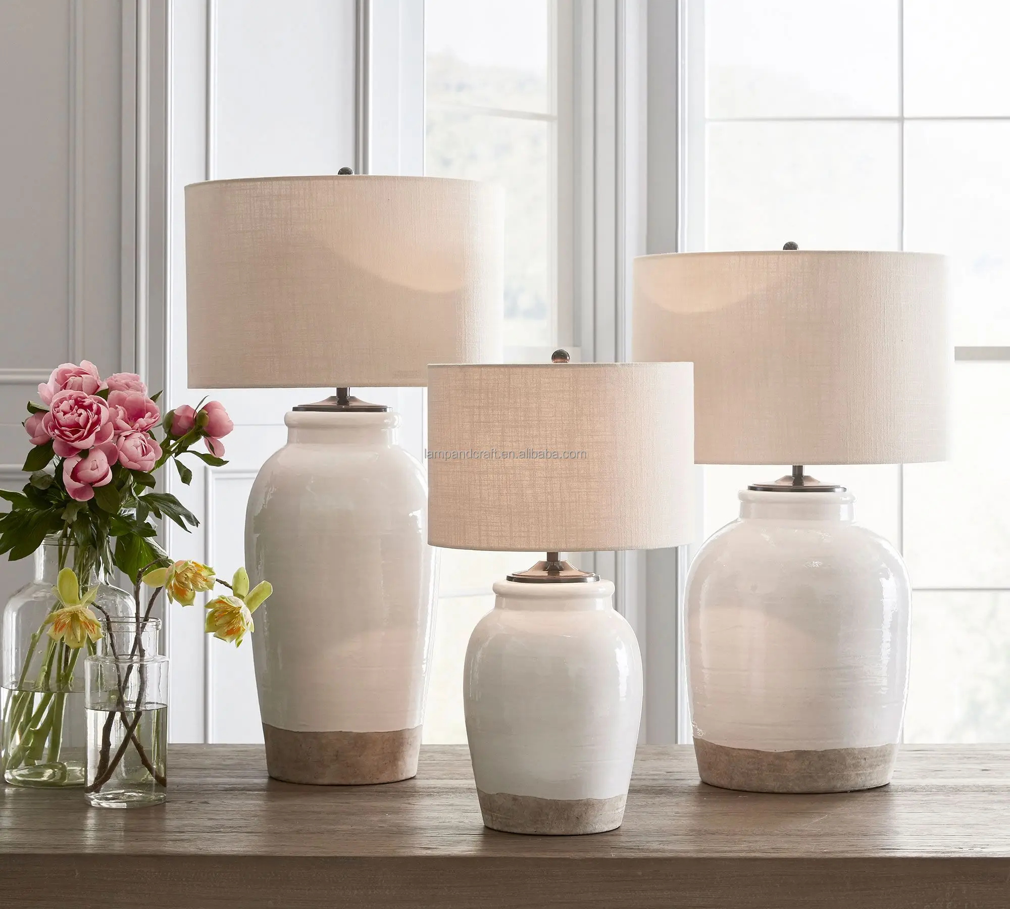 ceramic base table lamp Includes a cream linen drum shade