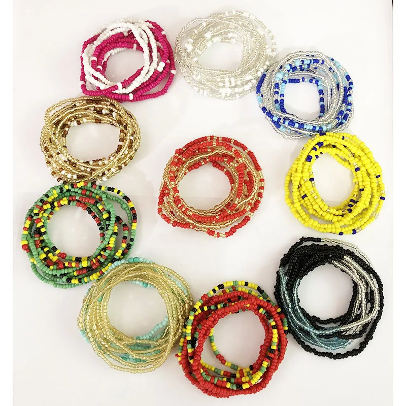 
2 PCS /Set simple beach rice beaded waist chain bikini chain belly manual rice bead elastic rope waist chain women bracelet 