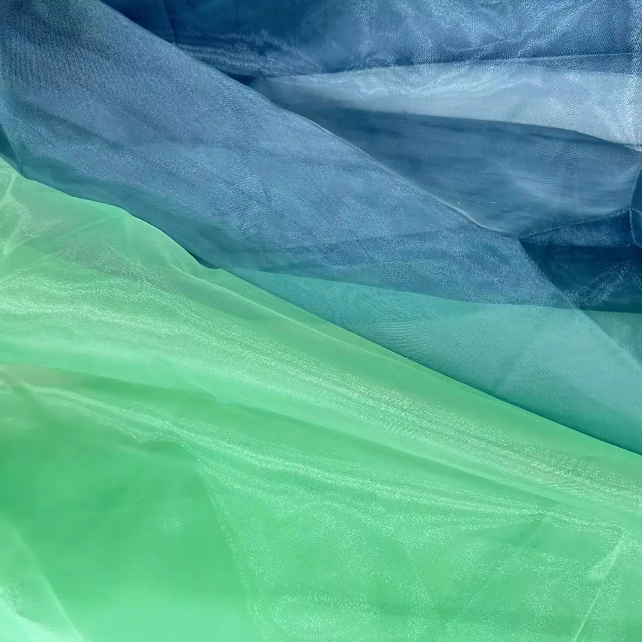 Favorable price soft and comfortable translucent organza fabric