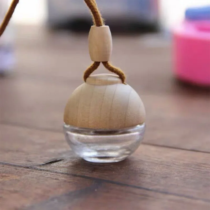 Mini cute glass wooden cap 5ml ball shape hanging car perfume bottle for car air fresh