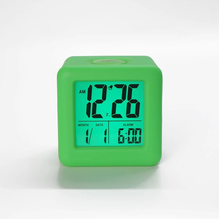 Hot selling multi color fancy cheap kids silicone alarm clock with light in the dark