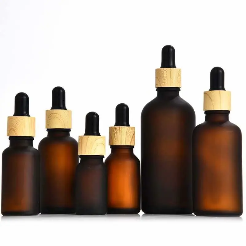 Glass oil dropper and spray mat black frosted amber glass bottle with bamboo spray pump 30 ml dropper cosmetic