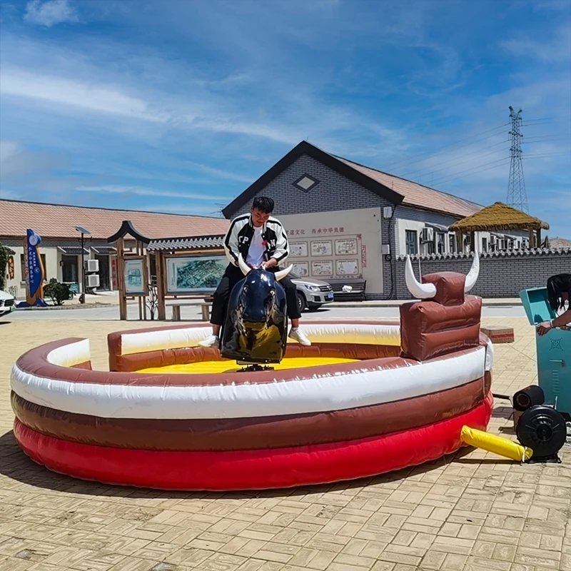 Spain crazy electric inflatable game adults mechanical ride  rodeo bull riding machine for sale