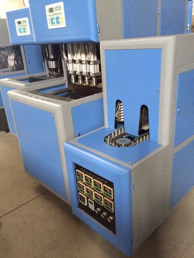 
4 cavity Semi automatic PET bottle blowing machine price 