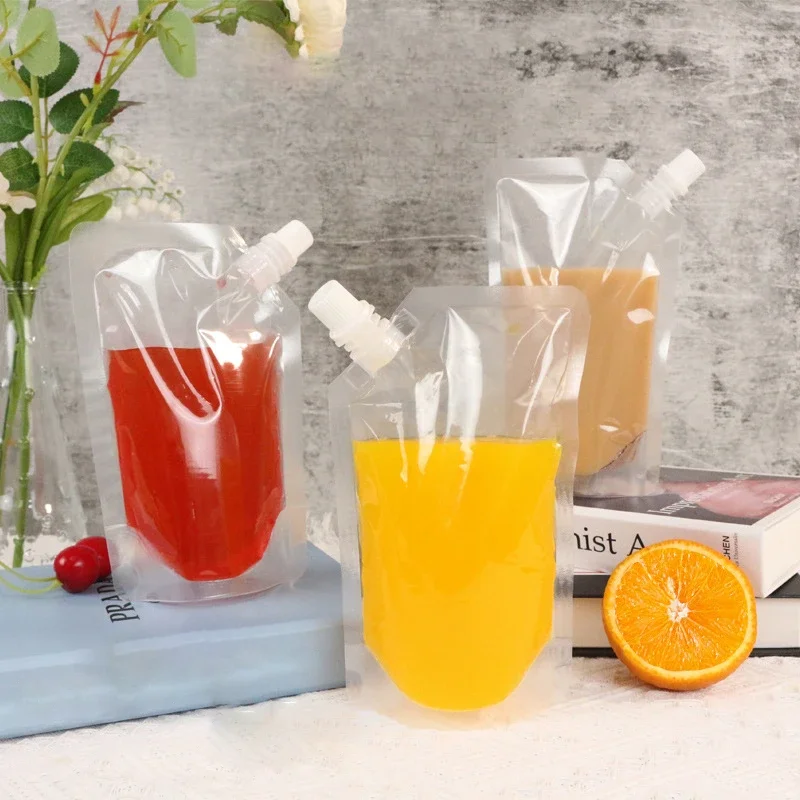 Wholesale Transparent Liquid Packaging Bags Drinking Plastic Juice Beverage Sealed Clear Stand Up Storage Pouches