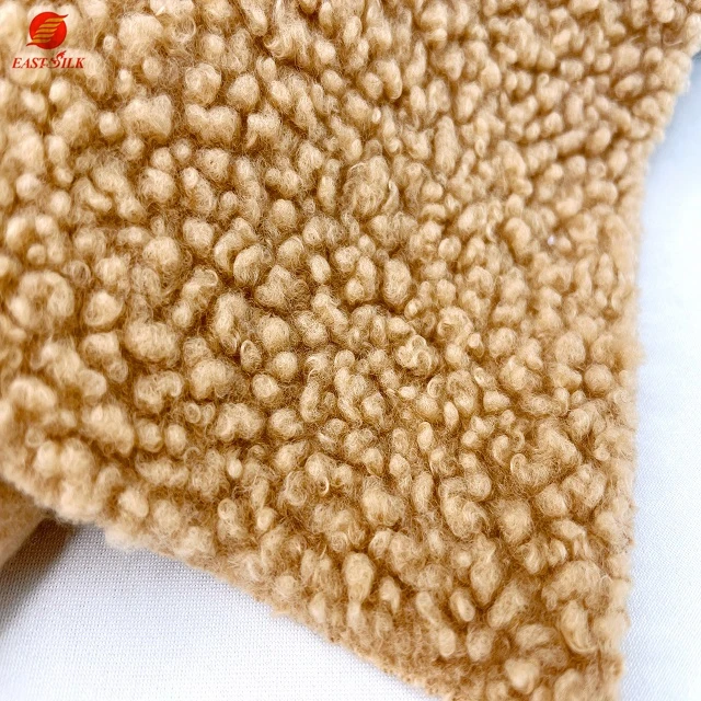High quality 100% polyester polar fleeced fluffy fabric Knitted sleepwear poly super soft fleece bonded fabric for coat