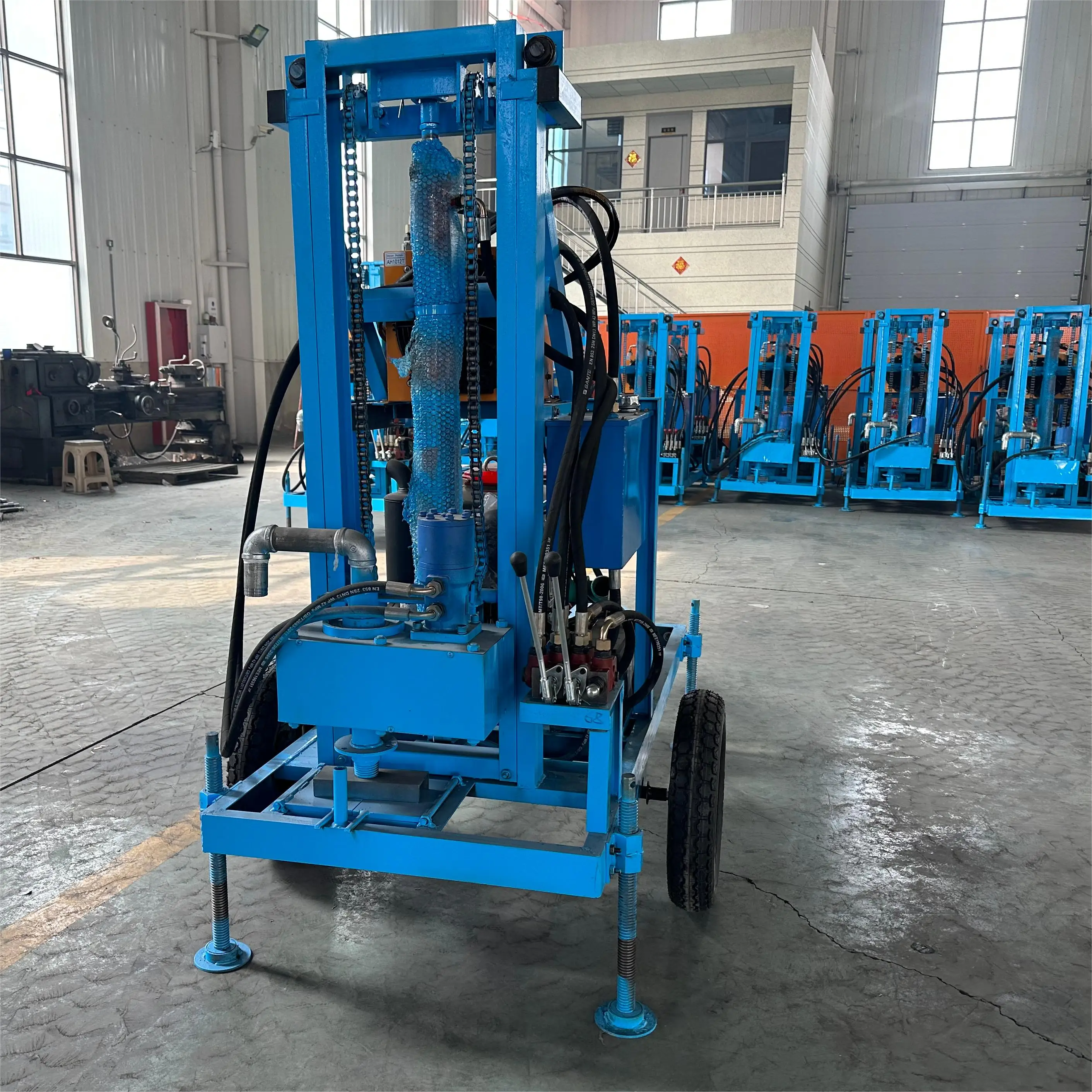 Hot selling wheel diesel 100m 150m 200m small portable water well drilling rig factory direct sales