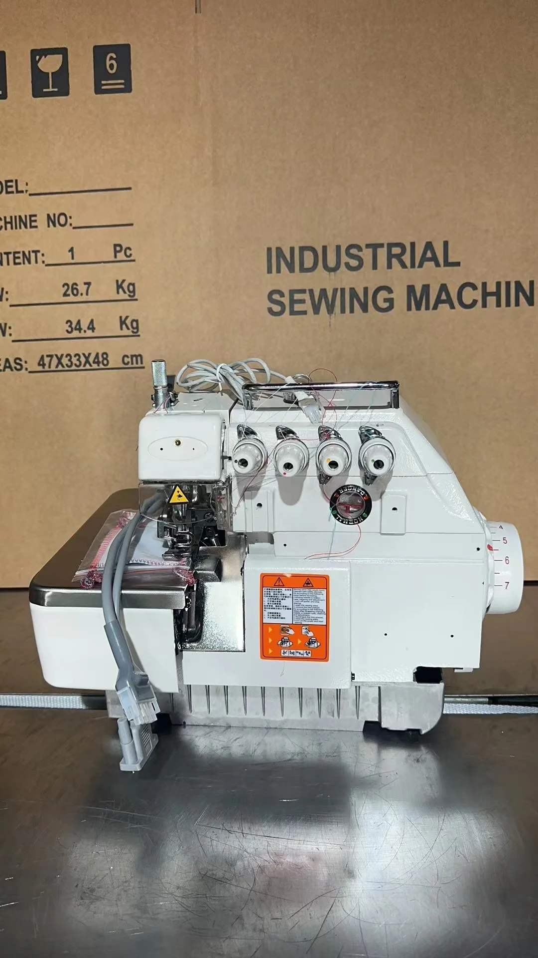 QK-747 cheap price 747 model Servo motor belt 4 thread overlock sewing machine industrial