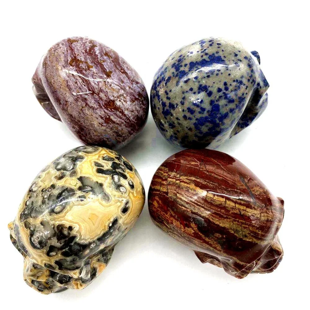 High quality hand carved natural crystal skull art sculpture folk crafts rainbow jasper skull for decoration