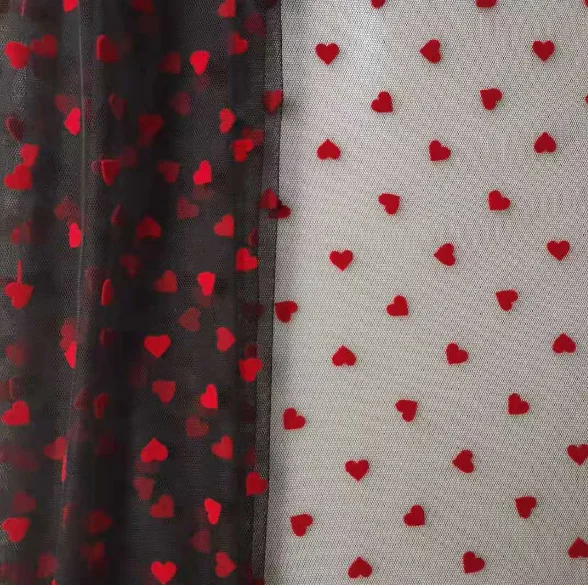 China manufacturer high quality fancy design soft tulle heart flocked mesh fabric for dress