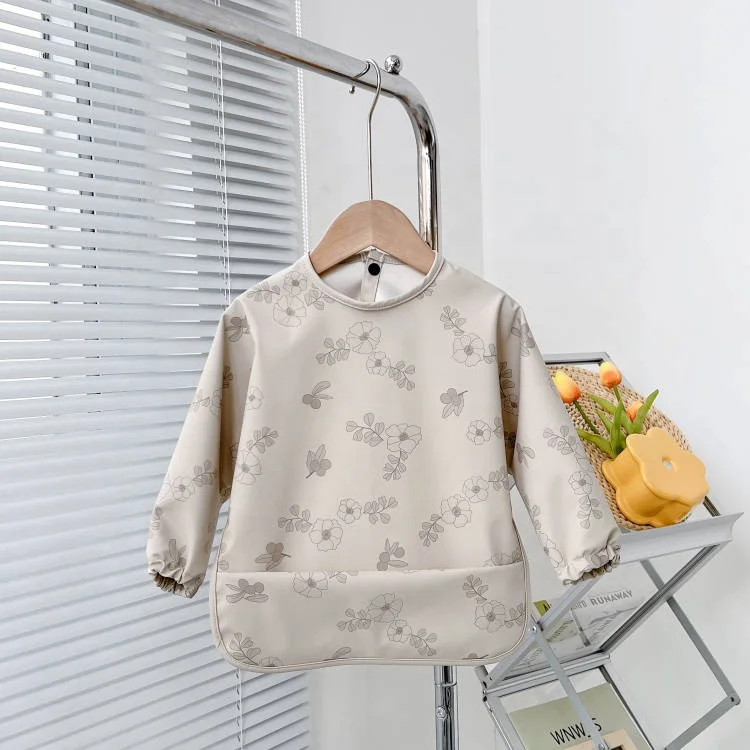 New PU waterproof food bib for childrenThe baby dining clothesLarge pocket recyclable fabric long sleeve reverse dressing