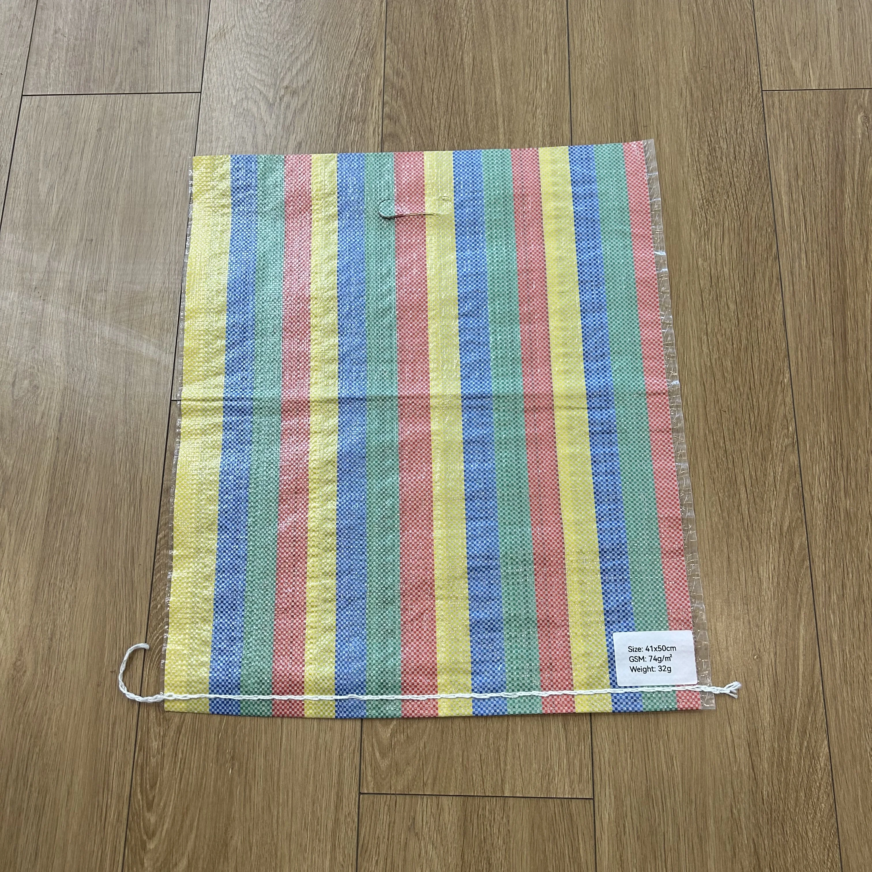 Ghana Multi-color Stripes Laminated PP Woven Shopping Bag Polypropylene Market Sacks With D-cut Handle For Grocery Packaging