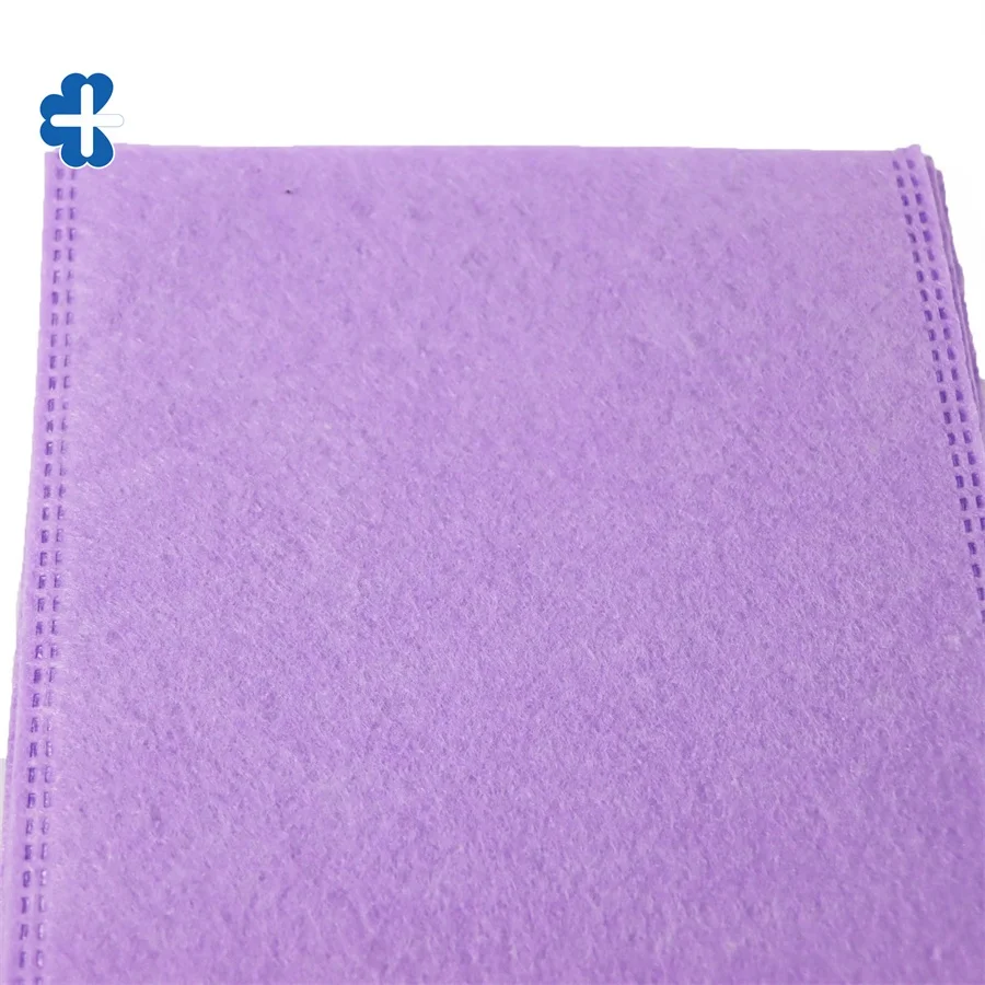 Purple Color soft Disposable Non Woven Molton Washing Gloves To Cleaning Patient Body
