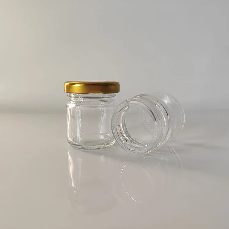 Cheap Promotion 50ml 75ml Clear Glass Sauce Canned Honey Pickles Jam Jars Packaging with Gold Lid