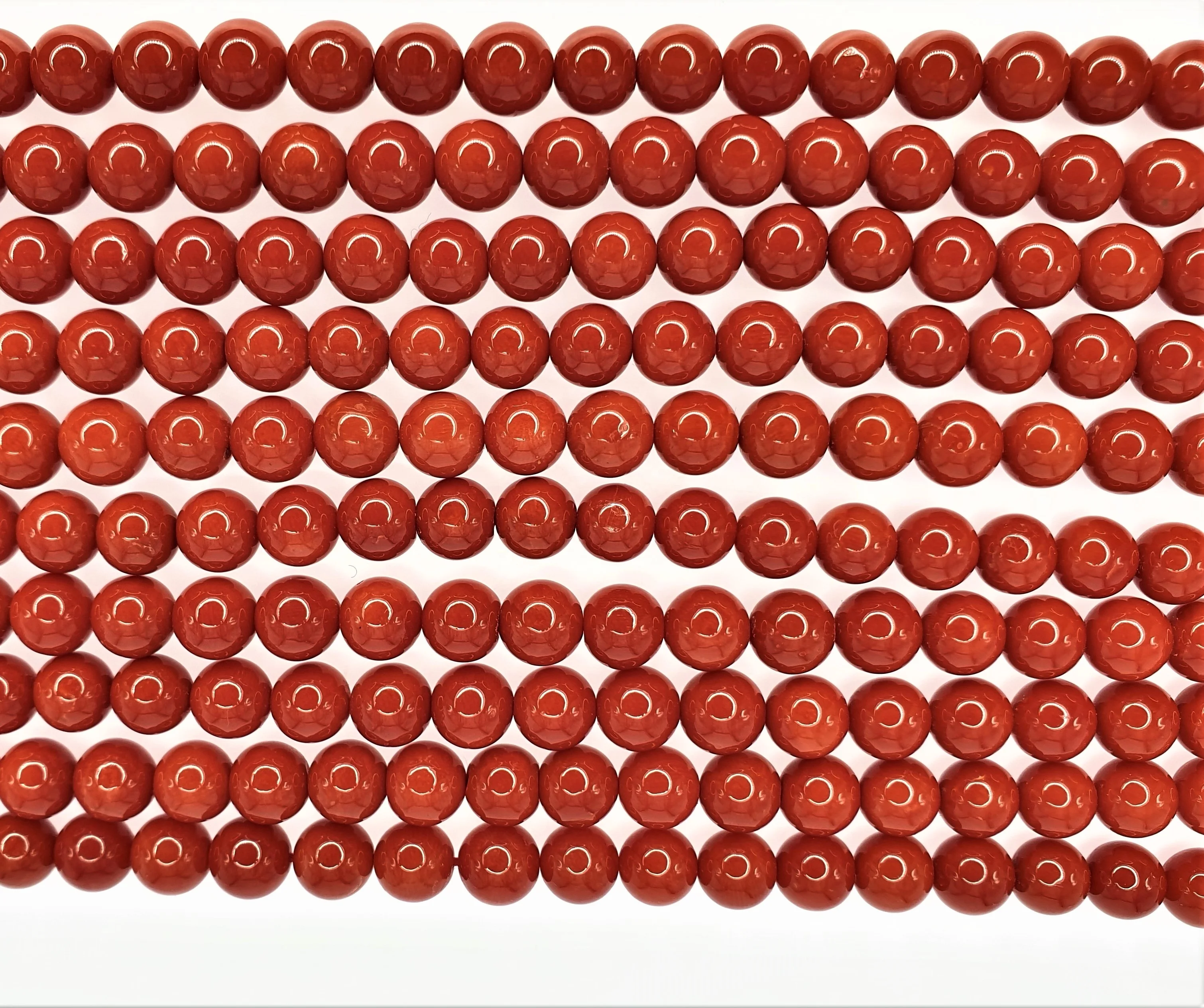 RED CORAL ROUND BEADS 11 MM STRANDS
