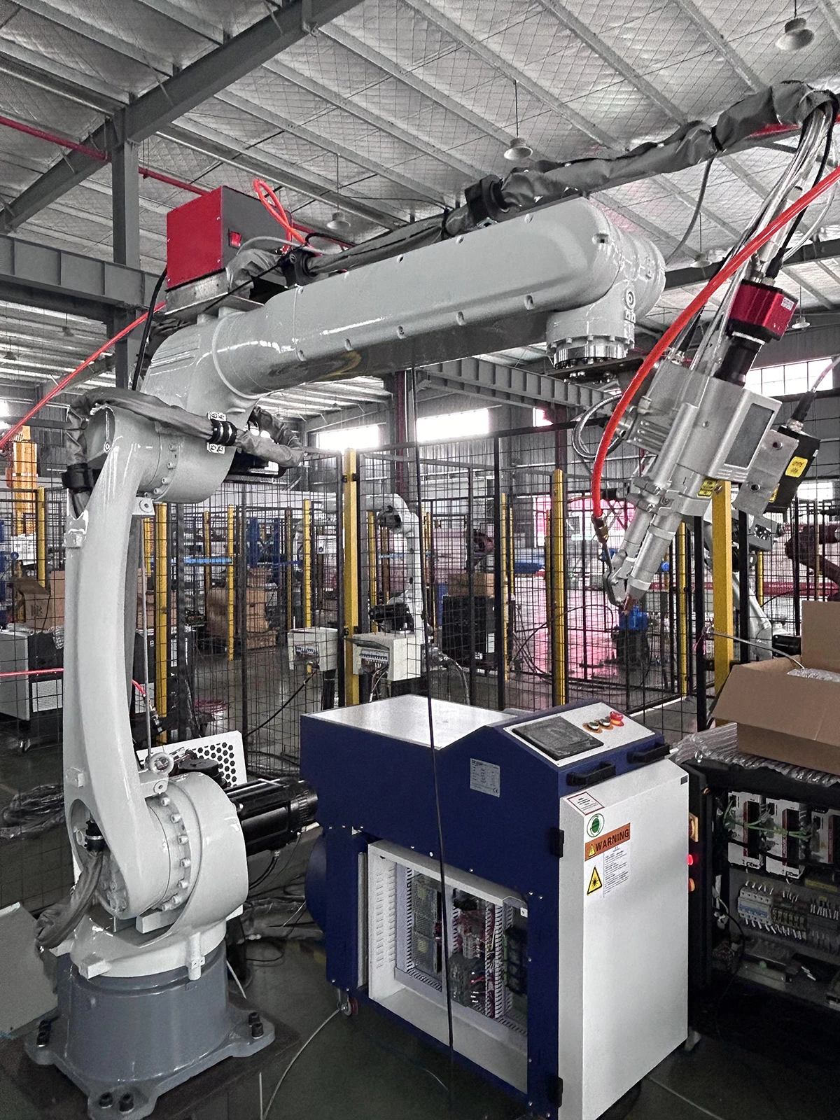 Stainless steel automatic laser welding machine robot arm welding machine price