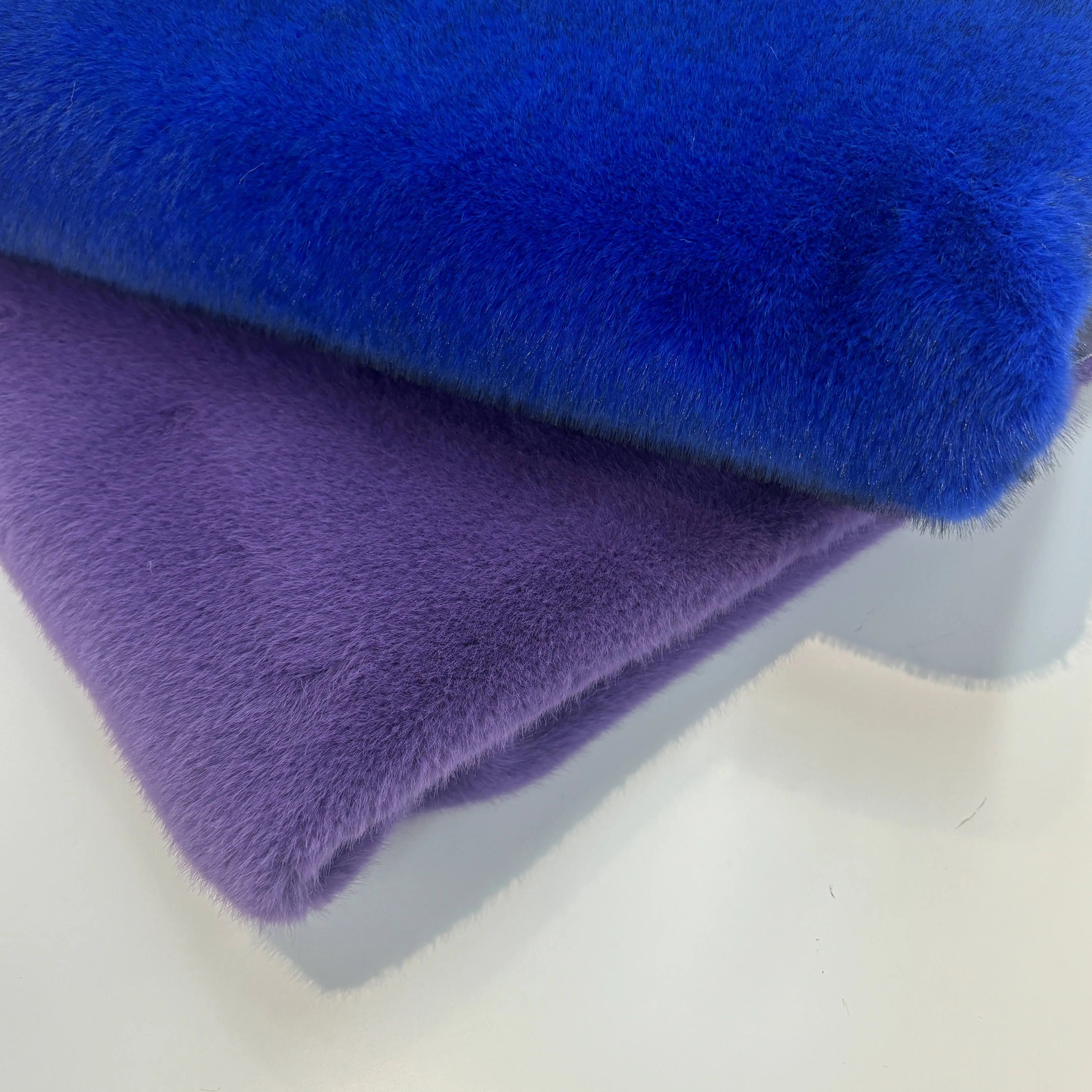 Hot wholesale gem blue print pointed weft knitted artificial mink fabric for autumn and winter coats