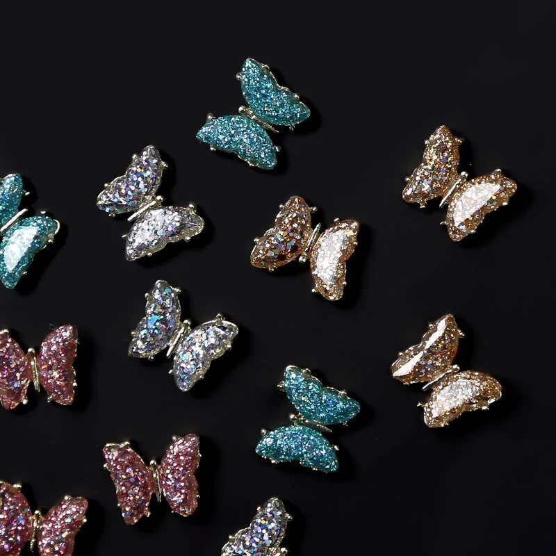 Factory Price Aurora Colorful Butterfly Nail Rhinestones 3D Metal Alloy Silver Bows Nail Art Charm Decoration Supplies