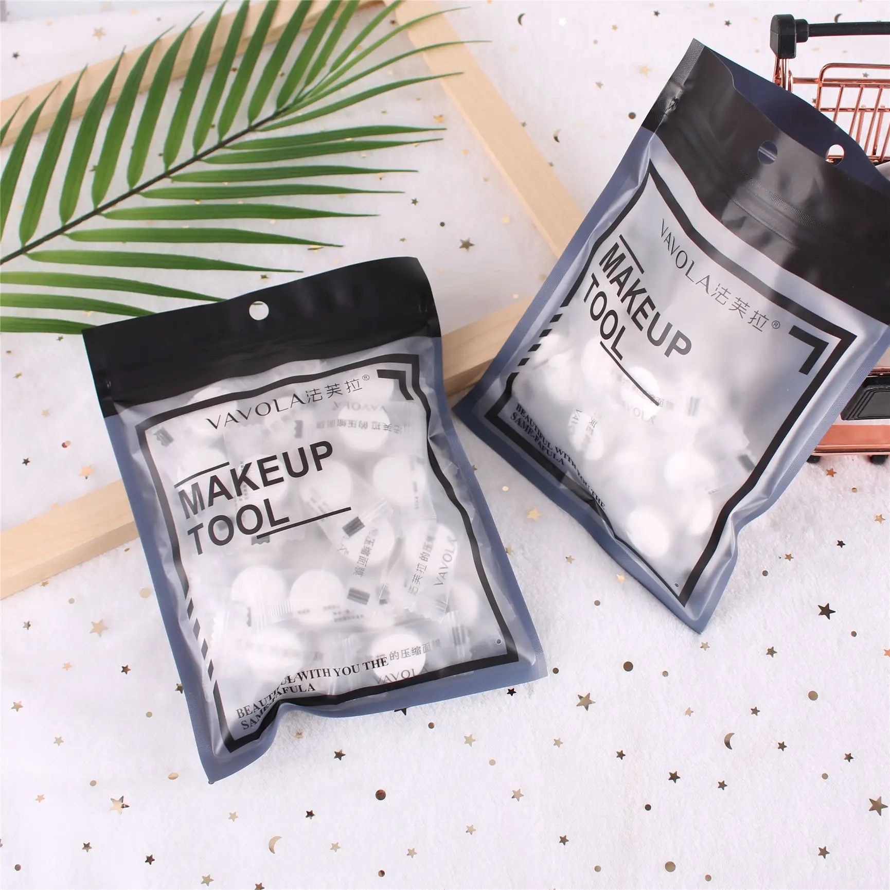 Hot price dazzling black series non-woven fabric compression mask 50 tablets independently portable